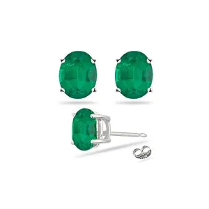 0.38-0.55 Cts of 5x3 mm AA Oval Natural Emerald Stud Earrings in 18K White Gold