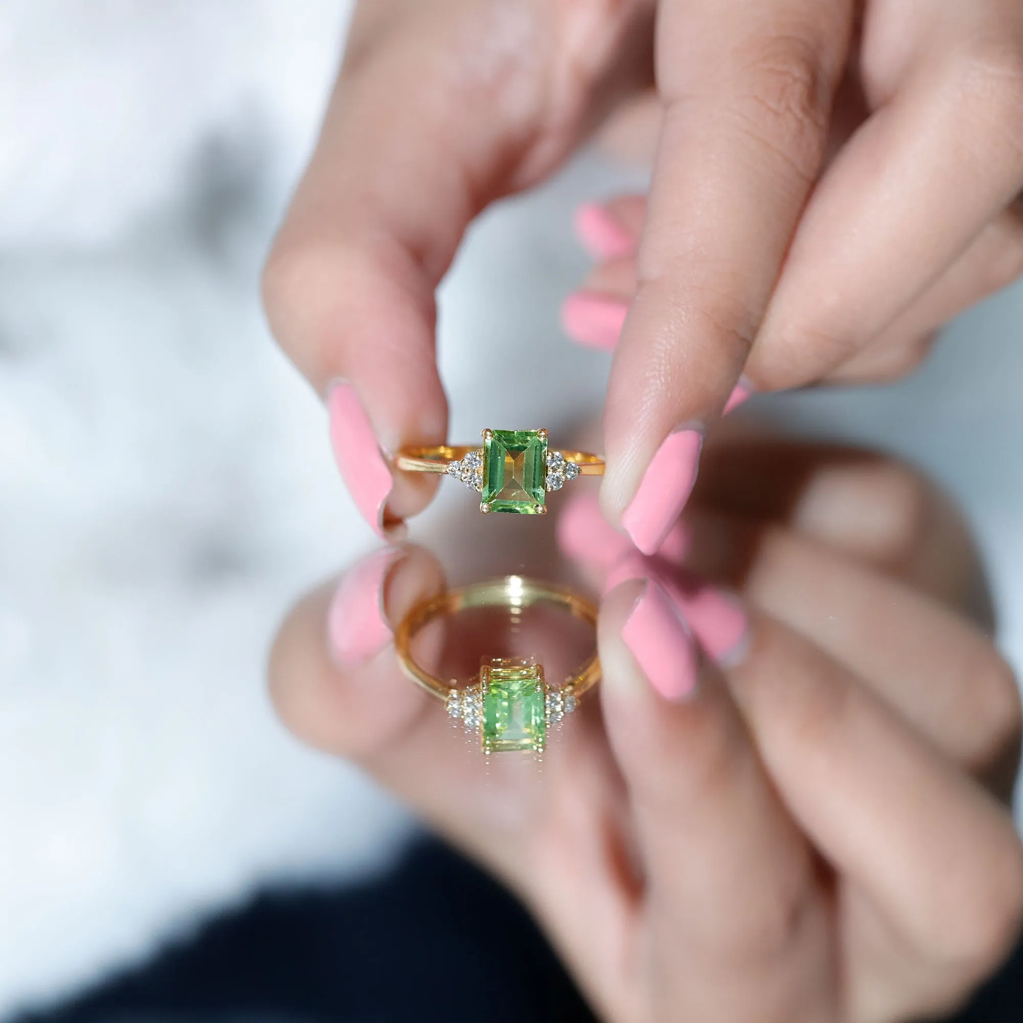 Emerald Cut Peridot Engagement Ring with Diamond Trio