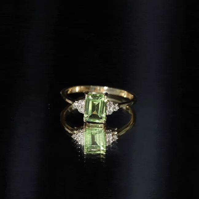 Emerald Cut Peridot Engagement Ring with Diamond Trio