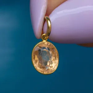 Small Peachy-Yellow Bezel Garnet Set Charm, 1.00ct